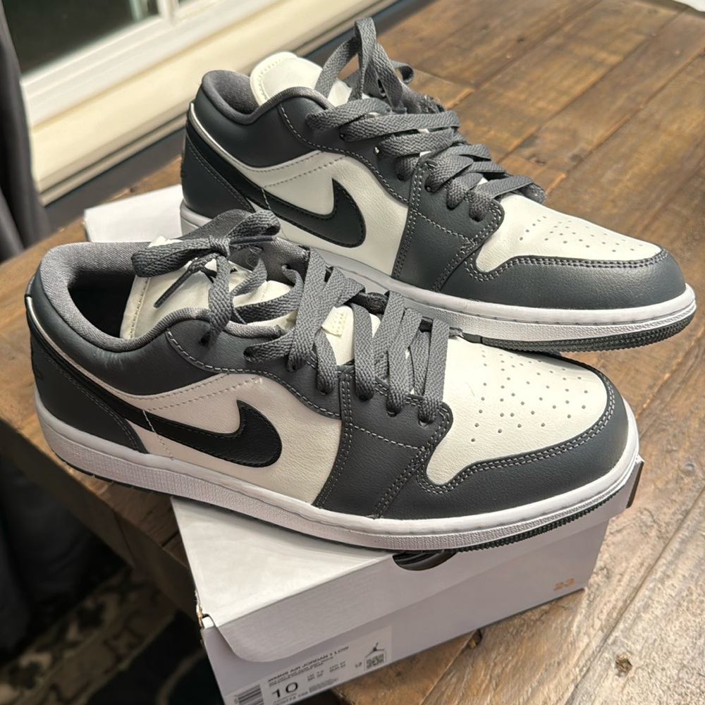 Brand new with box womens air Jordan low. Dark Grey and white